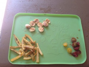 baked zucchini "fries", banana topped with tahini and heirloom tomatoes 