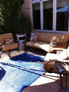 Here is another outdoor space we enjoy - also a part of the courtyard.  I have our sand & water table in this area as well.